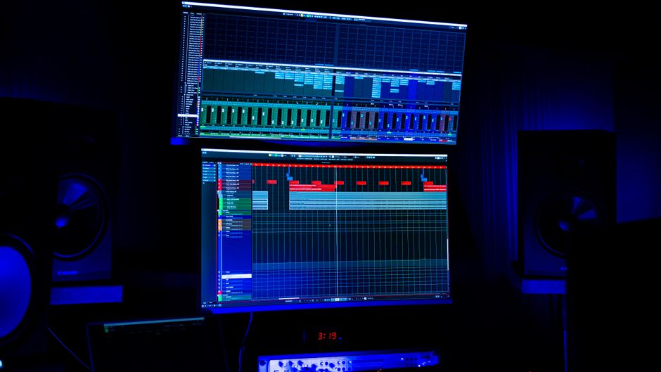 Studio recording screens displaying multitrack digital audio editing software (Image Credit: XT7 Core - Pexels)