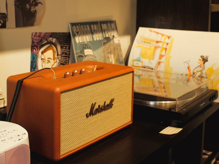 Vintage turntable record player with soul music vinyl records on display (Image Credit: Dongdilac - Pexels)