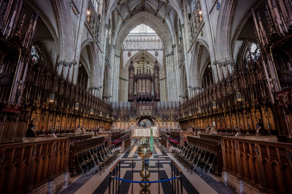 Gothic choir stalls and stone vaulted arches in York Minster cathedral (Image Credit: Michael D Beckwith - Pexels)