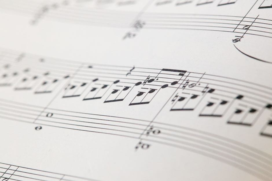 Detailed view of printed musical notes on classical score paper (Image Credit: César Guillotel - Pexels)